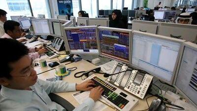 Regulators in the UAE are investigating Standard Chartered's operations in the Dubai International Financial Centre. Ali Haider / EPA