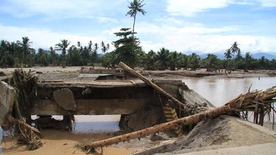 A general view of a destroyed bridge after flash floods in Salvador, Lanao del Norte, in southern Philippines on December 23, 2017. Richel V Umel / Reuters