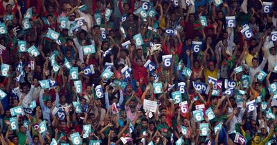 Bangladesh fans cheer on their team in their Asia Cup opener against Sri Lanka at the Dubai International Stadium. AFP