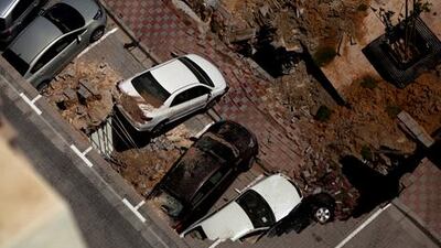 The scene of the collapsed car park at the Al Rayyana development.