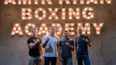 Boxer Amir Khan, second from right, with GymNation's Ant Martland, Frank Afeaki and Loren Holland. Photo: GymNation