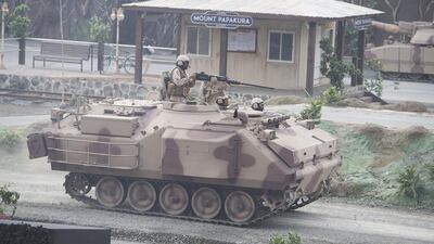 Members of the UAE Armed Forces participate in the opening ceremony of the 2017 International Defence Exhibition and Conference. Hamad Al Kaabi / Crown Prince Court - Abu Dhabi