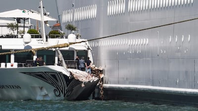 The damaged River Countess tourist boat is pictured after it was hit early by the MSC Opera cruise ship. AFP