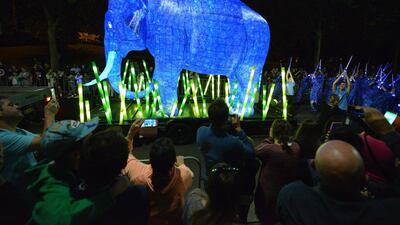 A giant light sculpture of an Asian elephant is driven through the central business district of Sydney to celebrate the 100th year anniversery of Taronga Zoo. The parade of ten giant animal light sculptures represented 10 of the most endangered species in the world to highlight the conservation efforts of Taronga Zoo. Peter Parks / AFP