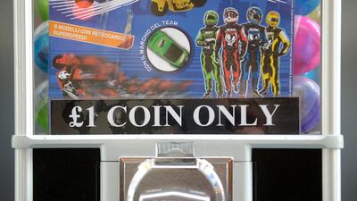 Children’s toy dispensers take one-pound coins. There are an estimated nearly £46 million forgeries in circulation. Bethany Clarke / Getty Images
