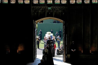 The coffin of Prince Philip, Duke of Edinburgh, is carried into his funeral service at St George's Chapel at Windsor Castle. Danny Lawson - WPA Pool/Getty Images