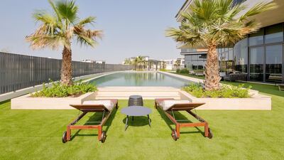 A resort-style garden to lounge in. Courtesy Luxhabitat Sotheby's International Realty