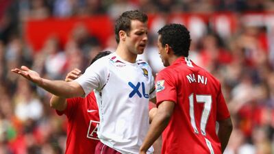 Lucas Neill of West Ham United squares up to Nani of Manchester United at Old Trafford on May 3, 2008 in Manchester, England. Getty Images
