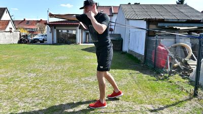 Polish pro cruiserweight boxer Mateusz Masternak trains in front of his home in Wroclaw. EPA