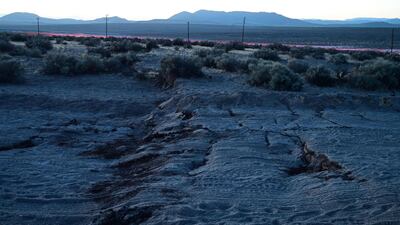 Surface ruptures and offsets caused by yesterday's magnitude 7.1 earthquake are seen as the sun sets along State Route 178 between Ridgecrest and Trona California on June 6, 2019. AFP