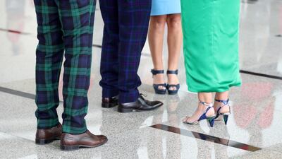 A man wears tartan trousers at the Dubai World Cup. Chris Whiteoak / The National