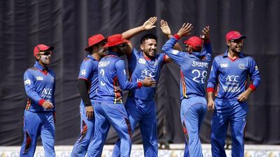 Afghanistan will swap their limited-overs kit for Test ones when they face Zimbabwe at Sharjah this year. Altaf Qadri / AP Photo