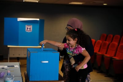 Israeli Arabs vote in Kfar Manda, an Arab town in Israel. AP