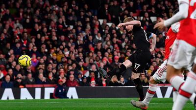 Manchester City's Kevin De Bruyne shoots to score the opening goal at the Emirates Stadium in London. AFP