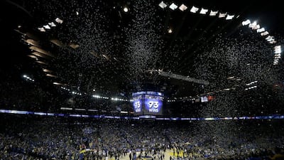 Confetti falls after the Golden State Warriors beat the Memphis Grizzlies 125-104 in an NBA basketball game in Oakland, California, Wednesday, April 13, 2016. Down to their final chance, the Warriors became the NBA’s first 73-win team. (AP Photo/Jeff Chiu)