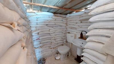 The home contains a modest kitchen and bathroom. Photo: Mohammed Abu Amra