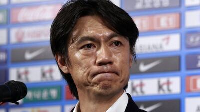 South Korea football coach Hong Myung-bo listens to a question during a news conference at the headquarters of the Korean Football Association in Seoul, South Korea on Thursday, July 10, 2014. Hong resigned Thursday as he took responsibility for his team's disappointing performance at the World Cup in Brazil. AP Photo/Ahn Young-joon