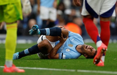 Manchester City's Rodri reacts after sustaining an injury in the Premier League match against Arsenal. Reuters