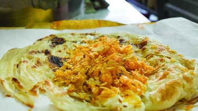 The Chips Oman Sandwich as prepared at Baith Al Baraka, the country's most famous Chips Oman cafeteria. Mona Al-Marzooqi / The National