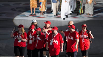 A group from Canada participate in the opening ceremony parade. Hamad Al Mansouri / the Crown Prince Court