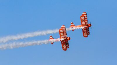 The wingwalkers perform over 80 displays each year at events throughout Europe and beyond and have recently displayed in Japan, India, Australia and China. Victor Besa for The National