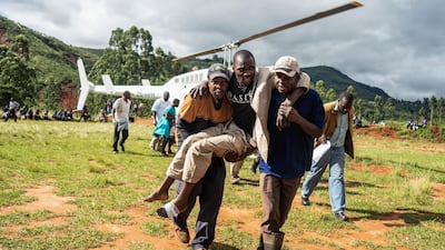 A wounded survivor is evacuated by helicopter from Chimanimani. AFP