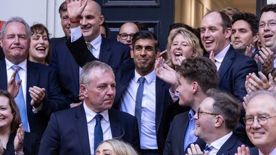 New Conservative Party leader and incoming Prime Minister Mr Sunak is greeted by colleagues at party headquarters in London in October 2022