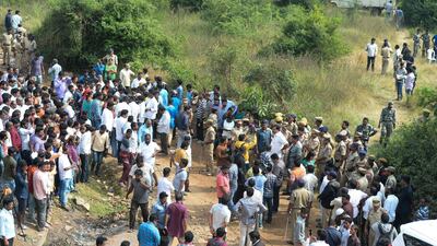 Police block an area near the site where they shot dead four detained gang-rape and murder suspects in Shadnagar. AFP