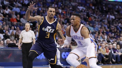 Russell Westbrook, right, has said all the "cares about is winning" and not any pursuit of triple-double history. Alonzo Adams / AP Photo