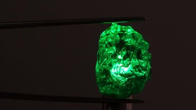 The nano technology is applied onto rough emerald crystals at the mine itself. Courtesy Gemfields