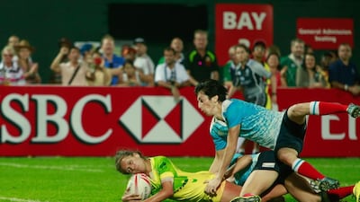 Australia, in yellow, defeated Russia to win the women’s final on Day 2 at the Dubai Rugby Sevens. Victor Besa for The National