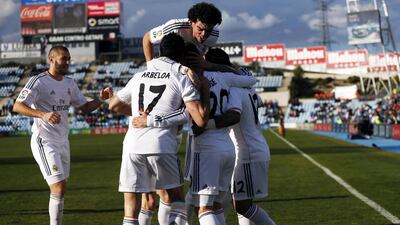 Real Madrid celebrate scoring against Getafe. Reuters