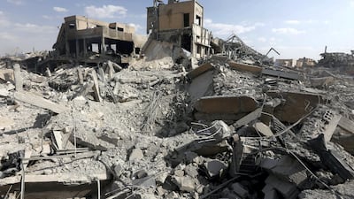 This picture taken on April 14, 2018 shows the wreckage of a building described as part of the Scientific Studies and Research Centre (SSRC) compound in the Barzeh district, north of Damascus, AFP Photo