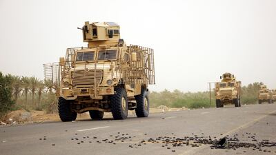 A column of Yemeni government forces and vehicles move closer to the western port city of Al Hodeidah, Yemen, on June 15, 2018. Najeeb Al Mahboobi / EPA
