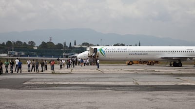 Each week, between nine and 14 flights with deported migrants land at the airport in Guatemala City, and two daily at San Pedro Sula in Honduras. Some people have been caught at the border, others have lived all their lives in the country. Karim Mostafa for The National