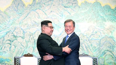 North Korean leader Kim Jong-un, left, and South Korean president Moon Jae-in embrace after signing the Panmunjom Declaration for Peace, Prosperity and Unification of the Korean Peninsula. orea Summit Press Pool / Getty Images
