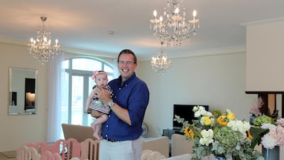 Andrew Cummings with his daughter Isabella Cummings at his new villa in Marina Promenade, Dubai Marina. He shifted from an apartment to a villa during the pandemic. Pawan Singh / The National