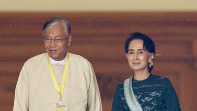 The newly elected president of Myanmar, Htin Kyaw with Aung San Suu Kyi at Myanmar’s parliament in Naypyitaw yesterday. AP Photo