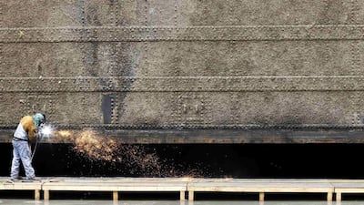 A Panama Canal employee works in a dry chamber of the Miraflores locks. The overhaul and culvert maintenance of the locks will take seven days around the clock to complete. Carlos Jasso / Reuters