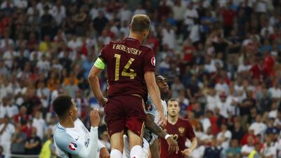 Russia’s Vasili Berezutski scores their first goal against England in their Euro 2016 match. Kai Pfaffenbach / Reuters