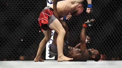 Petr Yan punches Aljamain Sterling. AFP