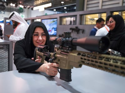 Visitors at the Caracal display area during the 16th International Defence Exhibition. Victor Besa / The National