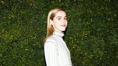 Mad Men’s Sally Draper, the American actress Kiernan Shipka wore a white cotton voile and silk blouse from Chanel’s spring/summer 2017 ready-to-wear collection, with a Chanel bag and shoes, and the Coco Crush diamond and Coco Crush rings from Chanel Fine Jewelry. Courtesy Chanel