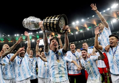 Lionel Messi celebrates with his Argentina teammates after beating Brazil in the 2021 Copa America final. Reuters