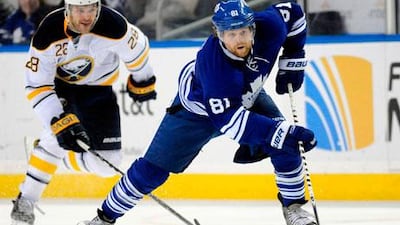 Paul Gaustad, left, and the Buffalo Sabres have been doing the same thing most of the NHL have been doing this year, trying to chase down Phil Kessel and the Toronto Maple Leafs.