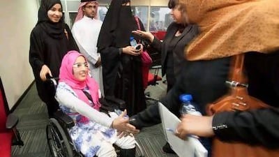 Fatima Mohammed, 16, (in a wheelchair) attends a forum on education for special needs children at Dubai School of Government.