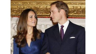 Britain's Prince William and his fiancee Kate Middleton pose for the media at St. James's Palace in London yesterday.