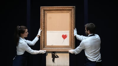 Banksy’s shredded ‘Girl With Balloon’. Getty