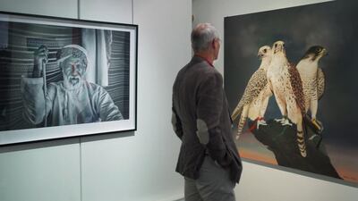 A visitor studies the exhibits at the Etihad Modern Art Gallery.