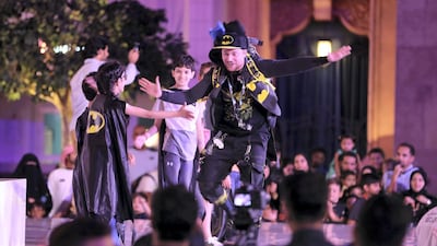 Children on stage during the Guinness World Record attempt held at Warner Bros in Abu Dhabi. Pawan Singh / The National